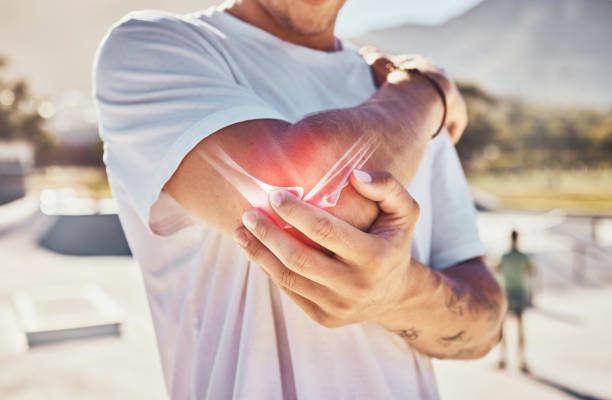 Man, joint pain and elbow arthritis in outdoor setup